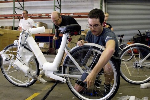Kansas City residents build their own bike sharing network. Photo via This Big City